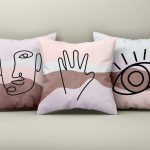Mockup of three large white pillows